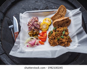 Pulled Pork With Coleslow, Jalapeno, Corn, Cherry And Bread.