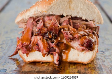 Pulled Pork Sandwich. Barbecue meat sandwiches.  Brisket, beef ribs, pork ribs, bbq chicken or turkey served on traditional white hamburger buns. Traditional classic Texas style bbq.  - Powered by Shutterstock