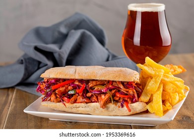 Pulled Pork Sandwich With Beer And Fries 