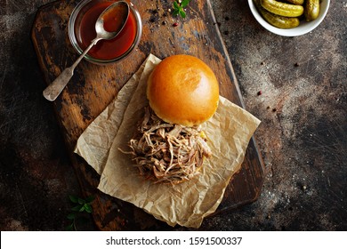 Pulled Pork Sandwich With Brioche Buns And Pickles Overhead View