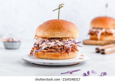 Pulled pork sliders with coleslaw, buns and seasoning. Pulled pork burgers.  - Shutterstock ID 2169248317
