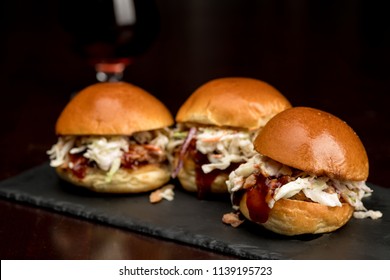 Pulled Pork Sliders On A Surving Platter Ready To Eat