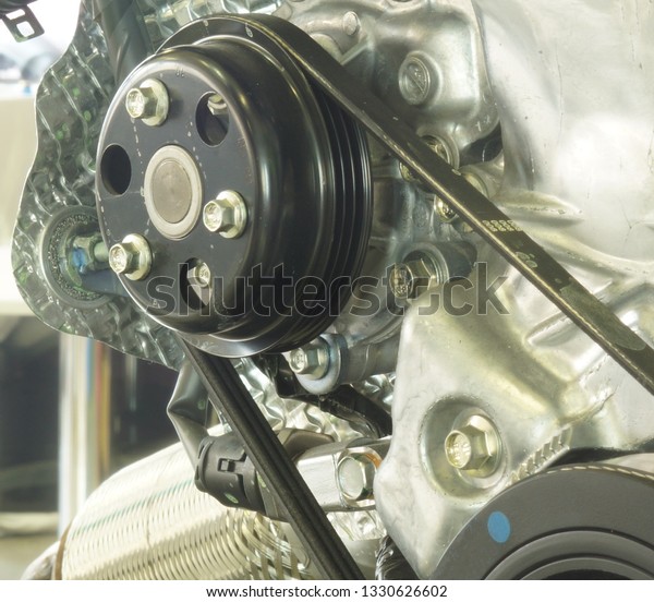 Pulley belt drive\
drive water pump car\
engine.