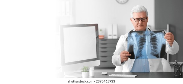 Pulmonologist with x-ray image of lungs in clinic. Banner for design - Shutterstock ID 2395465933