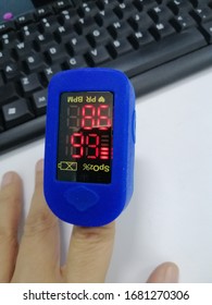 Pulse Oximeter Is Reading The Oxygen Saturation Inside Human Blood. 