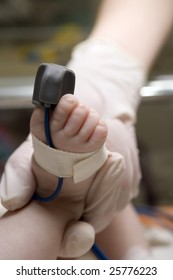 Pulse Oximeter Sensor On A Baby