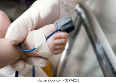 Pulse Oximeter Sensor On A Baby