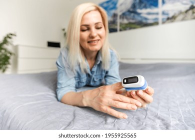 Pulse Oximeter Sensor On A Woman