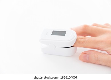 The Pulse Oximeter Which I Attached To The Hand Of The Woman