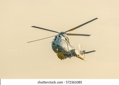 Puma Helicopter Pilots Training In The Sky, Sunset Time.