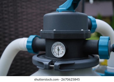 The pump responsible for filtering and ozonating to maintain a pristine outdoor swimming pool.