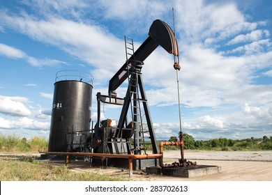 Pumpjack Pumping Crude Oil From Oil Well