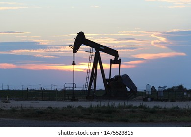 Pumpjack at sunset In West Texas