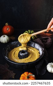 Pumpkin batter in bundt pan