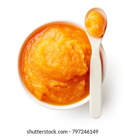 Pumpkin And Carrot Baby Puree In Bowl With Baby Spoon Isolated On White Background, Top View