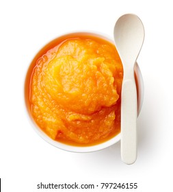 Pumpkin And Carrot Baby Puree In Bowl With Baby Spoon Isolated On White Background, Top View