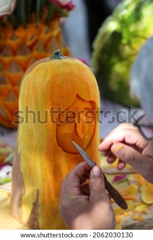 pumpkin carver working on project