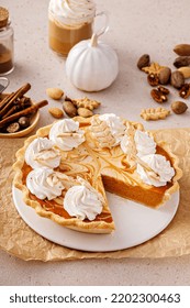 Pumpkin Cheesecake Swirl Pie Topped With Whipped Cream With A Slice Taken Out, Original Thanksgiving Dessert Idea, Overhead View