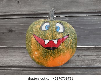 a pumpkin decorated as a face for haloween
