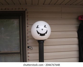 Pumpkin Face On Porch Light