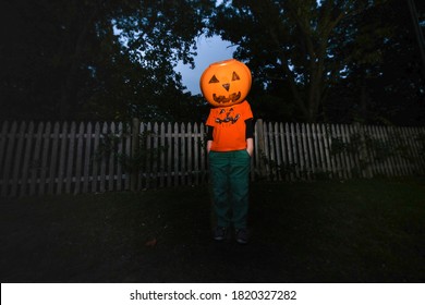 Pumpkin Head: Child Halloween With Pumpkin Decoration On Head