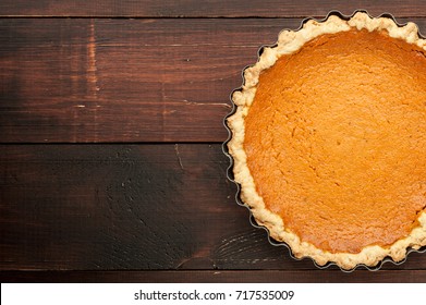 Pumpkin Homemade Pie On Wooden Background Top View