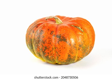 Pumpkin isolated on white with shadow and subtle reflection. Ripe ugly pumpkin, orange green pumpkin. Harvest.
