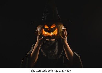 Pumpkin jack o lantern instead of a woman's head. Halloween