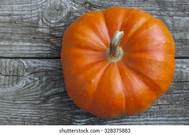 Pumpkin On Old Wooden Table.Top View.