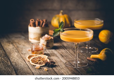 Pumpkin And Orange Spiced Fall Cocktail With Cinnamon