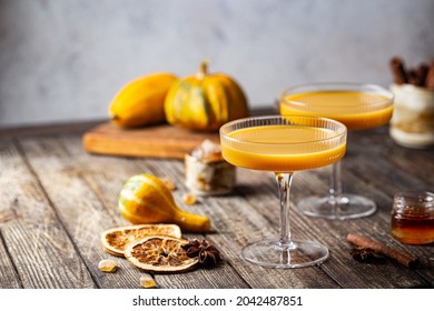 Pumpkin And Orange Spiced Fall Cocktail With Cinnamon