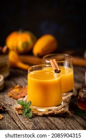 Pumpkin And Orange Spiced Fall Cocktail With Cinnamon