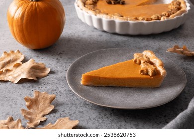 Pumpkin Pie with autumn leaves, Traditional food for Thanksgiving Day. - Powered by Shutterstock