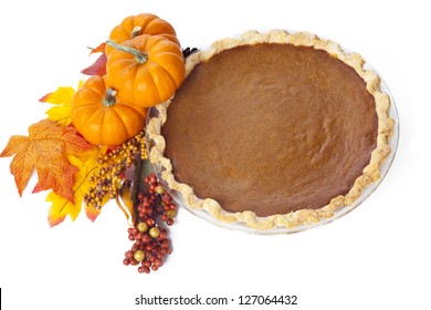 Pumpkin Pie And Leaves Isolated On White.