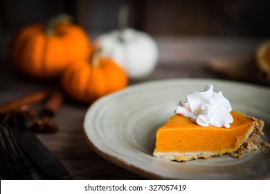 Pumpkin Pie On Rustic Wooden Background