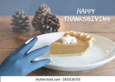 Pumpkin Pie On Table With Hand In Hygienic Protective Gloves For Thanksgiving During Covid Pandemic