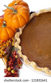 Pumpkin Pie On Table Isolated On White.