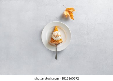 Pumpkin Pie Piece Of Cut, Served On A Plate, Top Down View, Fall Culinary Concept