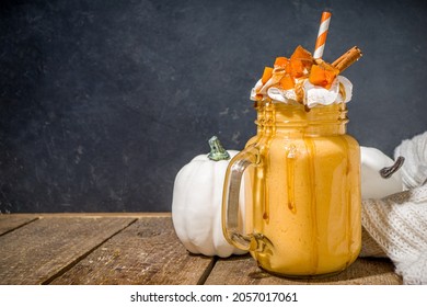 Pumpkin Pie Smoothie. Crazy Shake Cocktail With Traditional Autumn Apple Pecan Flavor, Wooden Dark Background Copy Space