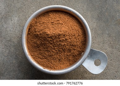 Pumpkin Pie Spice In A Measuring Cup