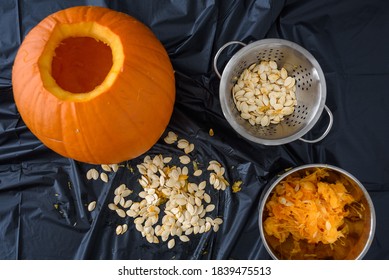 Pumpkin Seed Harvesting, Woman’s Hands Sorting Seeds And Pumpkin Guts
