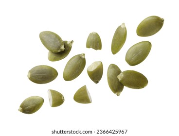 Pumpkin seeds flying close-up on a white background. Isolated
