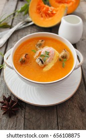 Pumpkin soup with seafood - Shutterstock ID 656108875