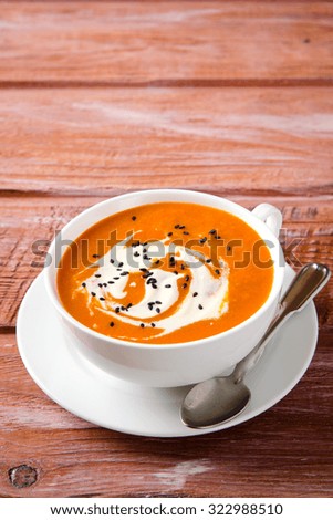 Similar – Foto Bild Kürbissuppe in weißer Schüssel und Zutaten auf Holztisch