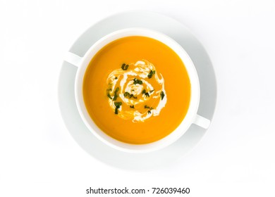 Pumpkin Soup In White Bowl Isolated On White Background.Top View