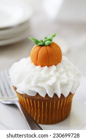 Pumpkin Spice Cupcake With Vanilla Frosting