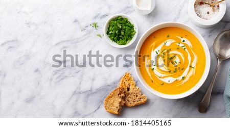 Pumpkin traditional soup with creamy silky texture. Marble background. Copy space. Top view. ストックフォト © 