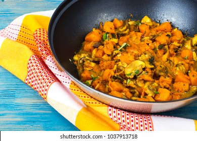 Pumpkin, Vegetable And Mushroom In The Wok. Studio Photo
