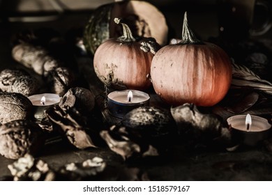 Pumpkins in the candle light of the hearth