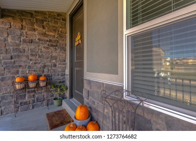 Pumpkins Decorate A Brick Entry Way Of Home